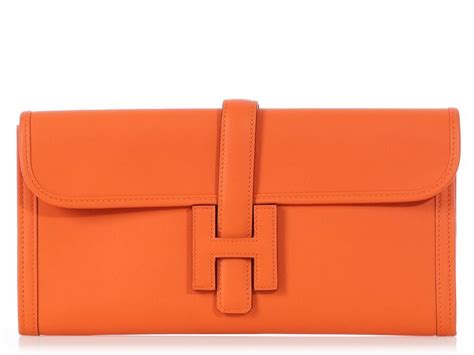 hermes orange clutch